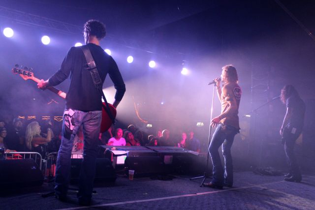 Fans enjoying Blackjack Billy at the 2014 Sturgis Motorcycle Rally